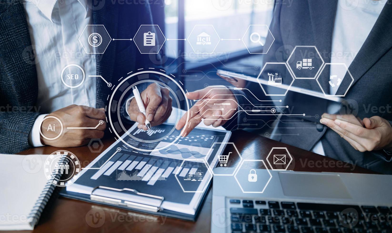 Working team meeting concept, business using laptop and smart phone and digital tablet computer with digital marketing media  in virtual icon network diagram office in morning light photo