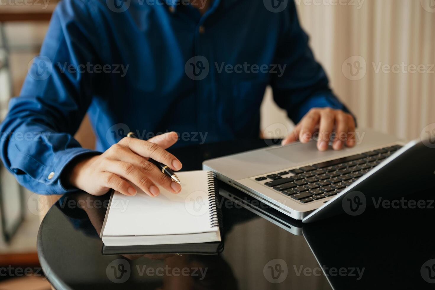 businesswoman hand working with new modern computer and writing on the notepad strategy diagram as concept photo