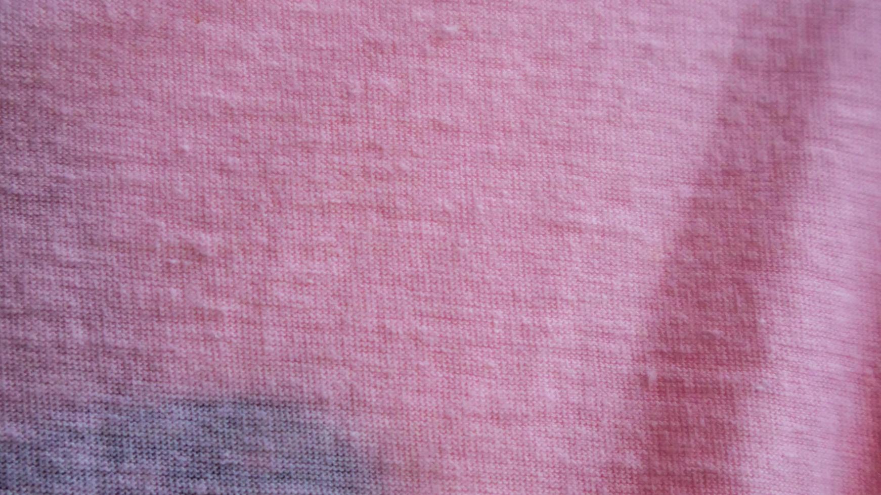 textura de tela rosa como fondo foto