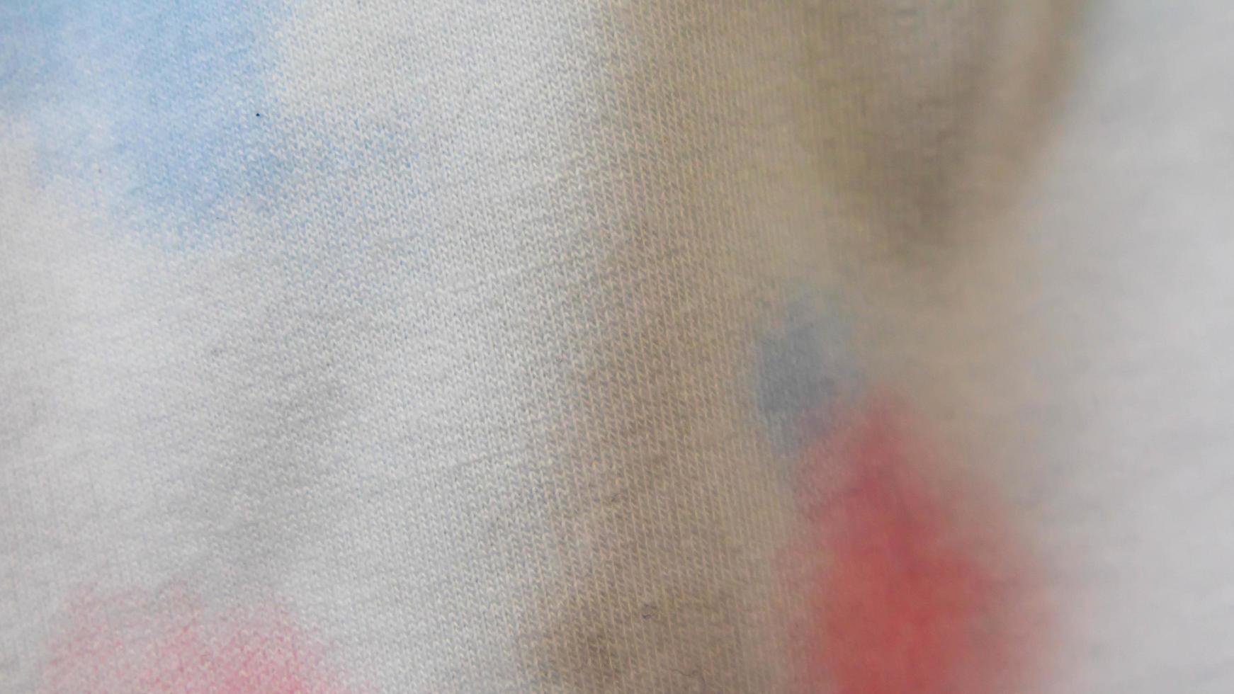 white cloth texture patterned red and blue as background photo