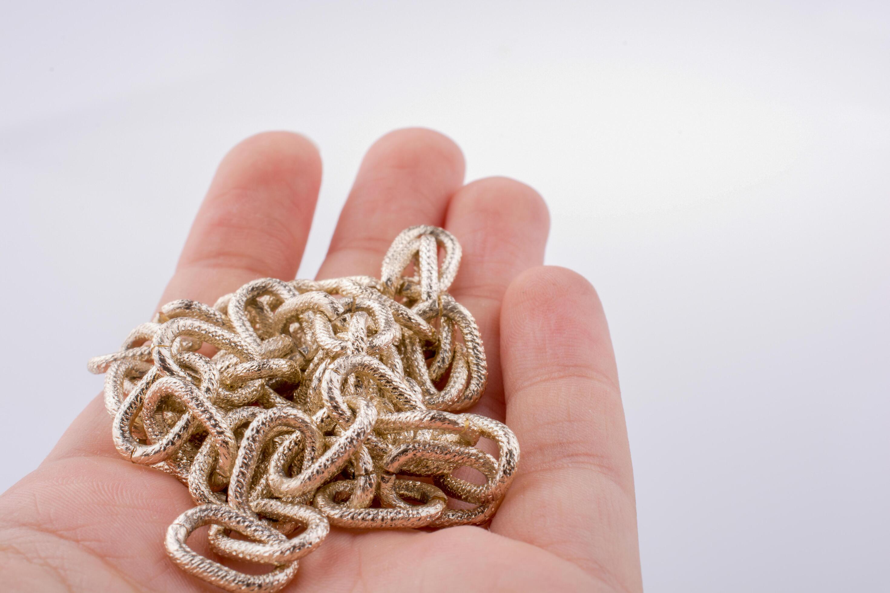 Chain Made Of Gold Color In Hand 16206968 Stock Photo At Vecteezy chain-made-of-gold-color-in-hand-16206968-stock-photo-at-vecteezy