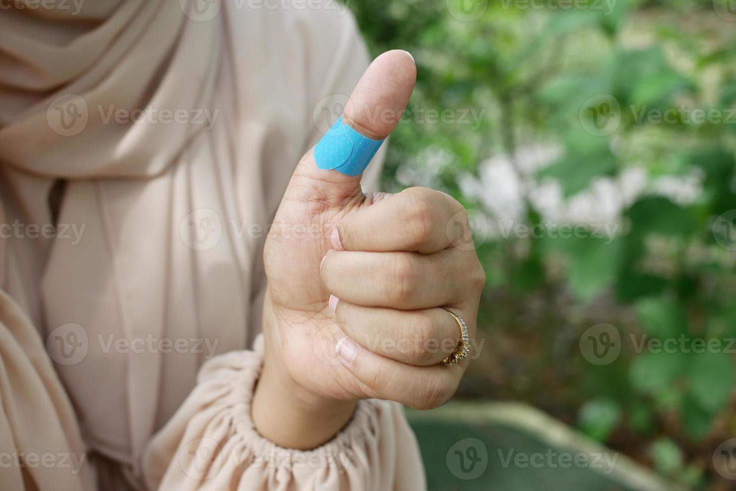 adhesive bandage on hand close up photo
