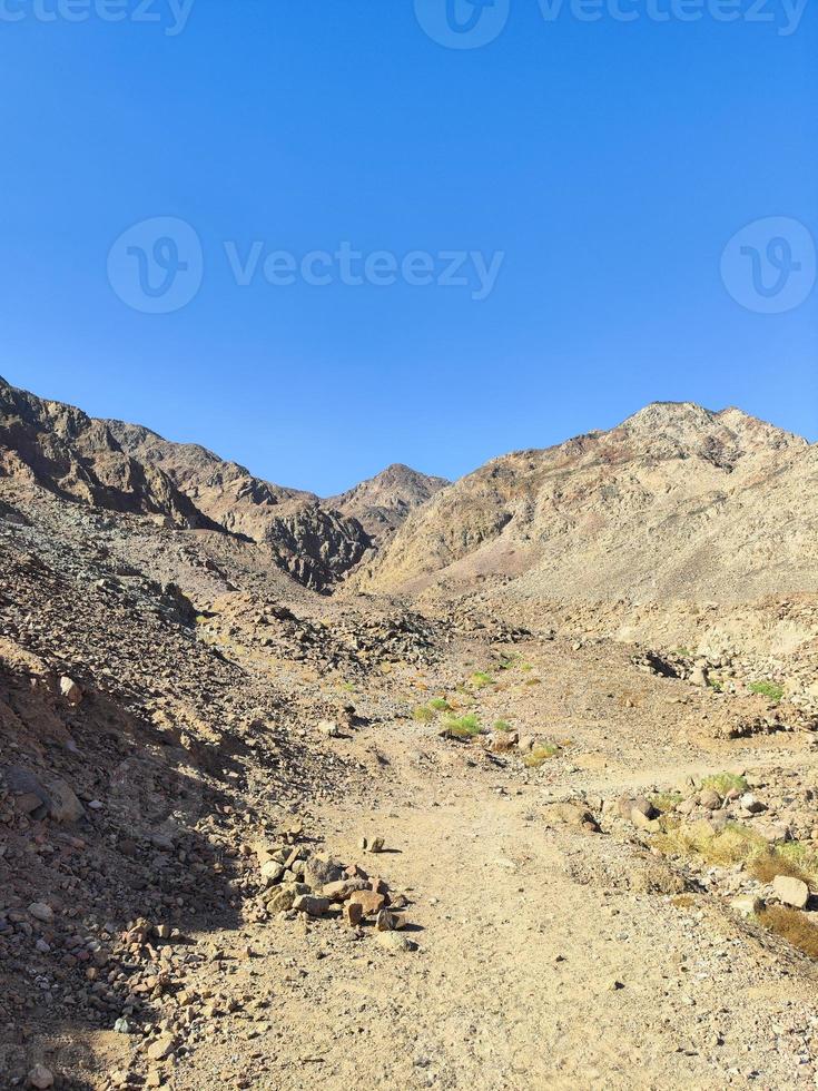 Mountains way in Sinai against clear sky photo