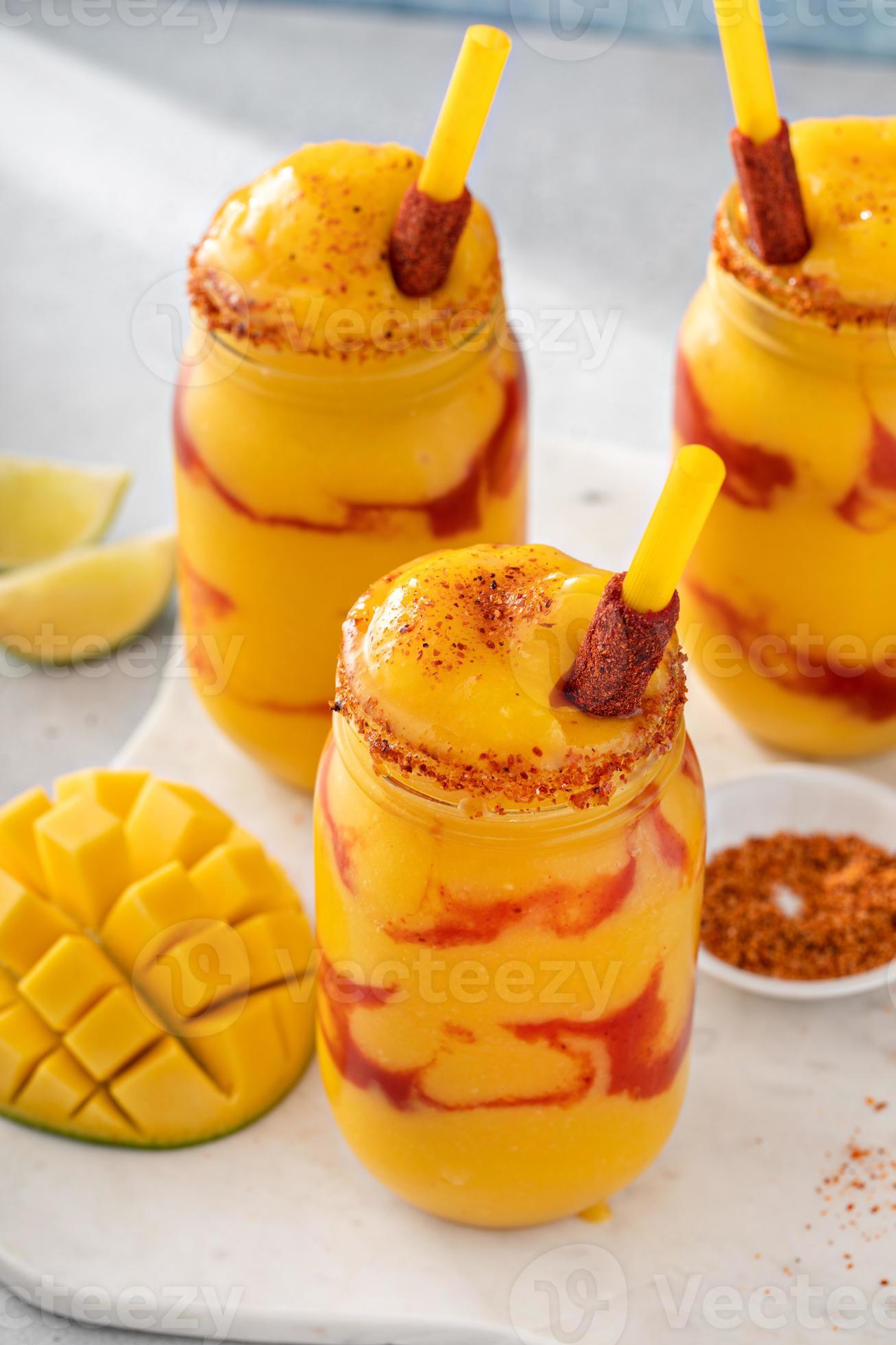 Mangonada mexican mango smoothie with chamoy sauce and lime seasoning