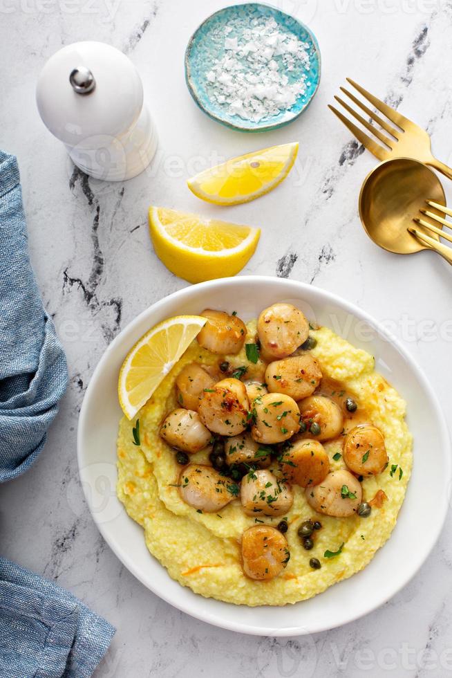 Seared scallops with grits 16212123 Stock Photo at Vecteezy