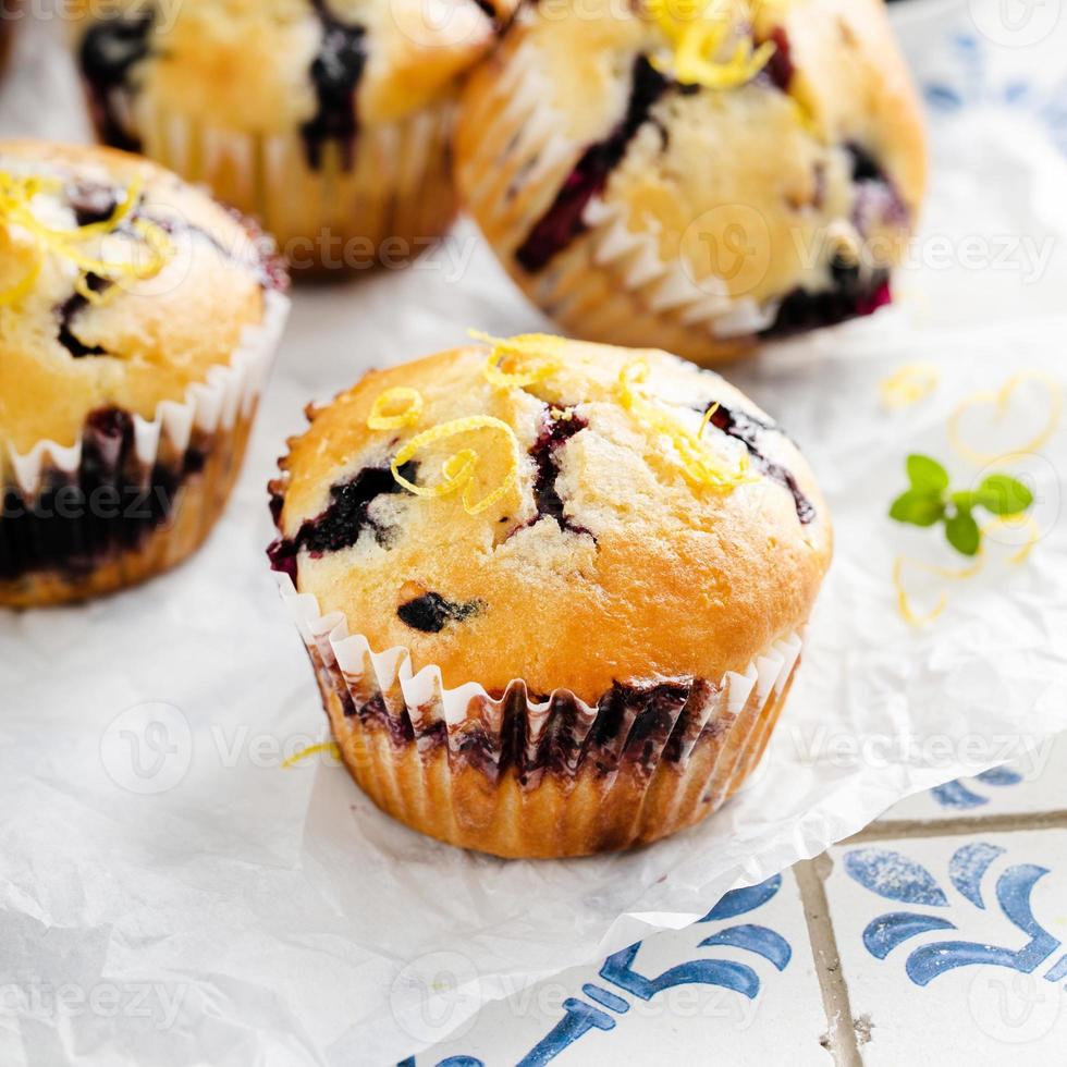 Blueberry muffins with fresh berries and preserves photo