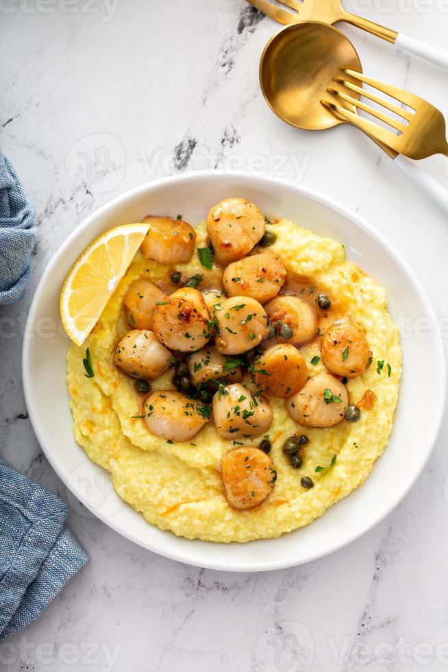 Seared scallops with grits 16212147 Stock Photo at Vecteezy