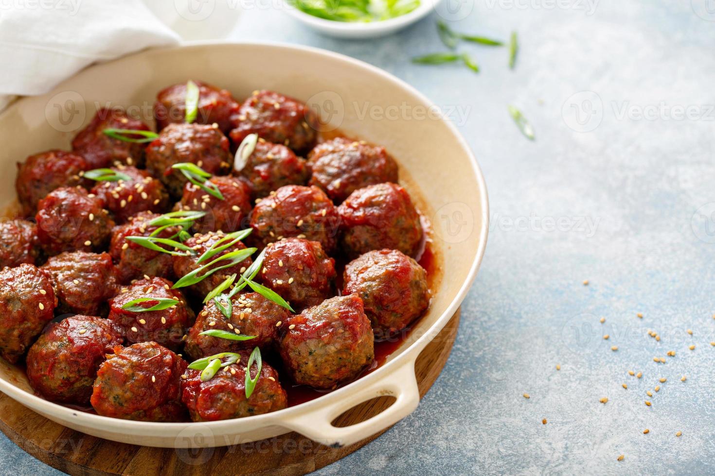 Asian meatballs with sweet and sour sauce photo