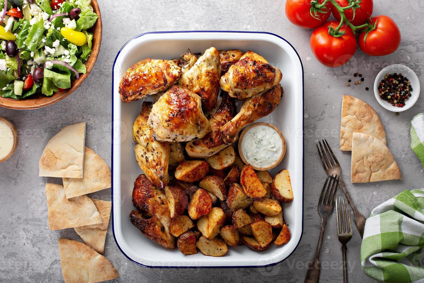 Roasted chicken and potatoes photo