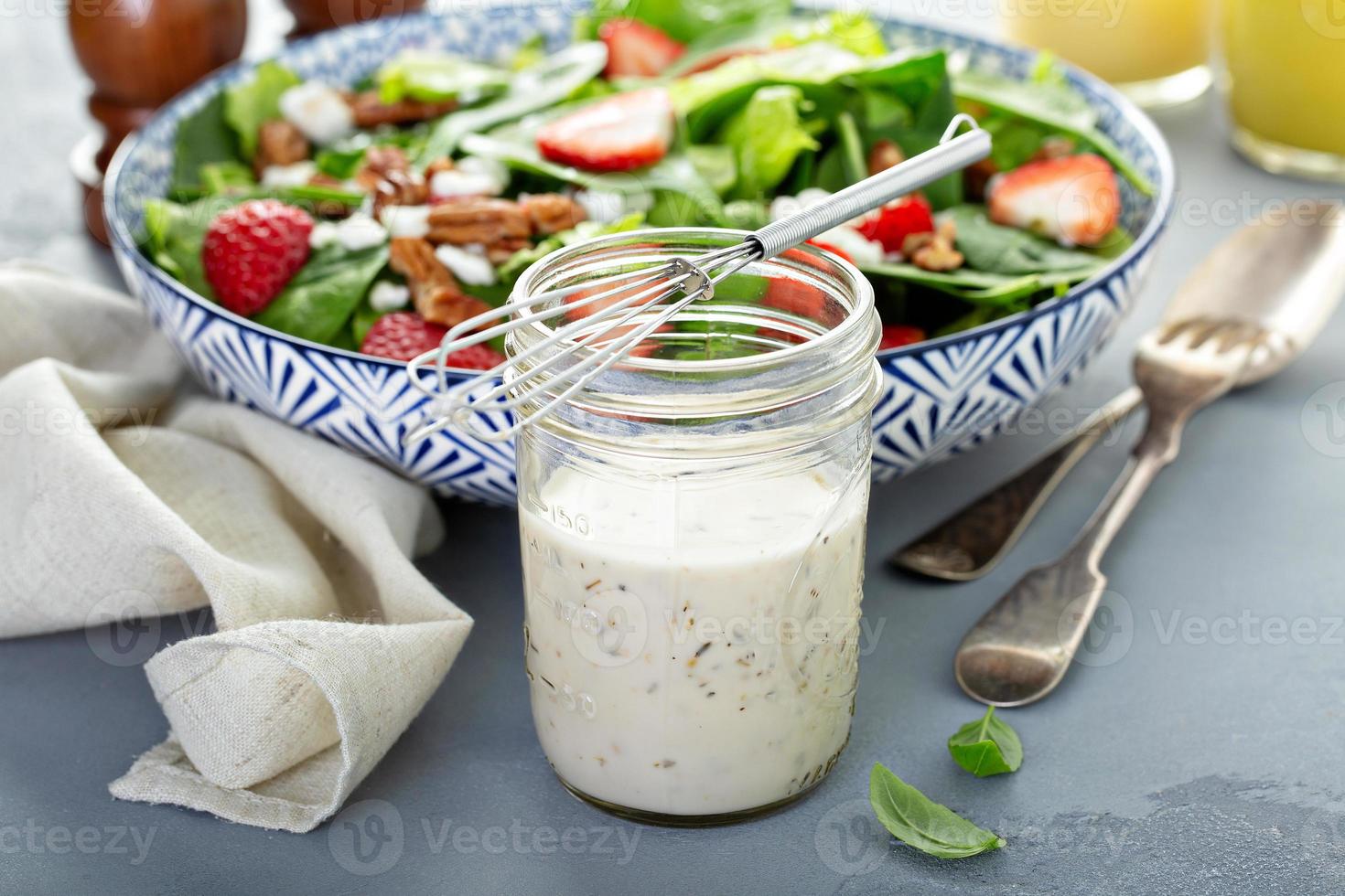 Homemade ranch dressing in a glass jar photo