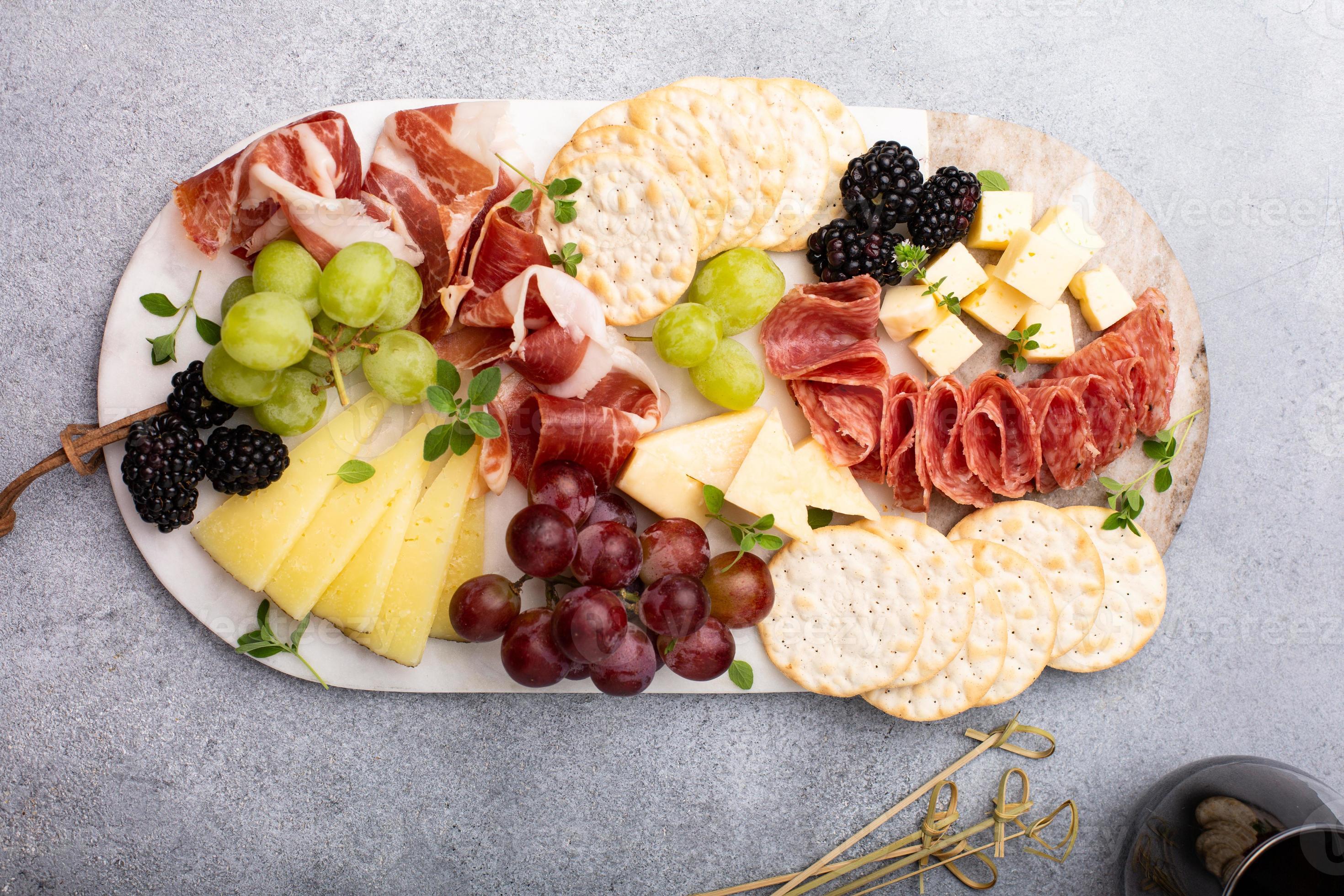 Summer charcuterie board with cheese, meat and fruit 16212246 Stock
