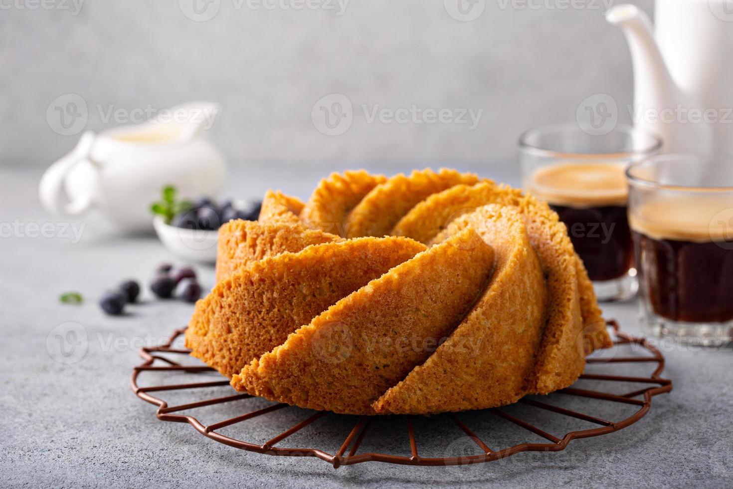 Bundt cake with coffee and blueberries photo