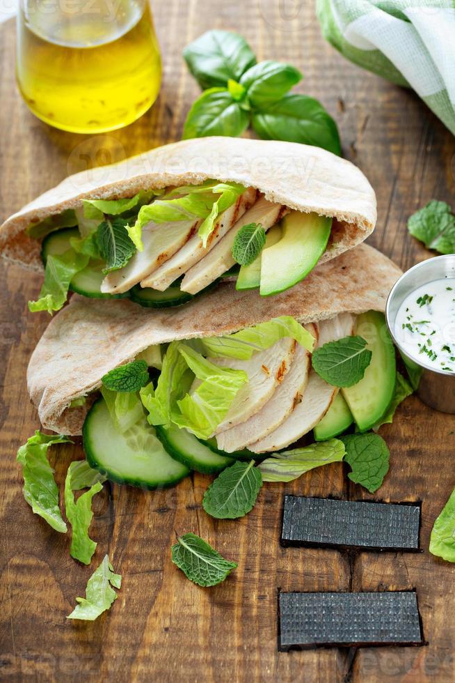 Healthy pita sandwich with chicken photo