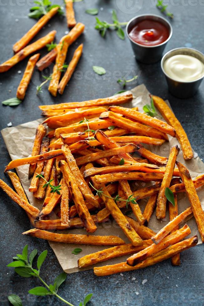 Sweet potato fries with sauces photo