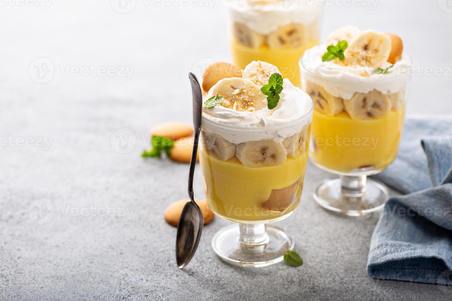 Banana pudding in small glasses photo