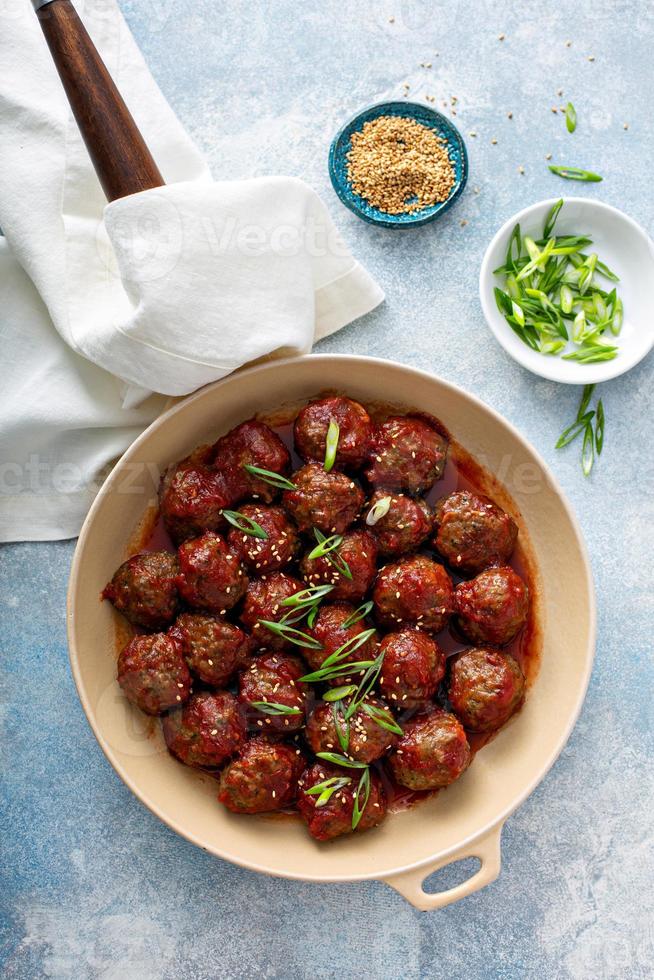 Asian meatballs with sweet and sour sauce photo