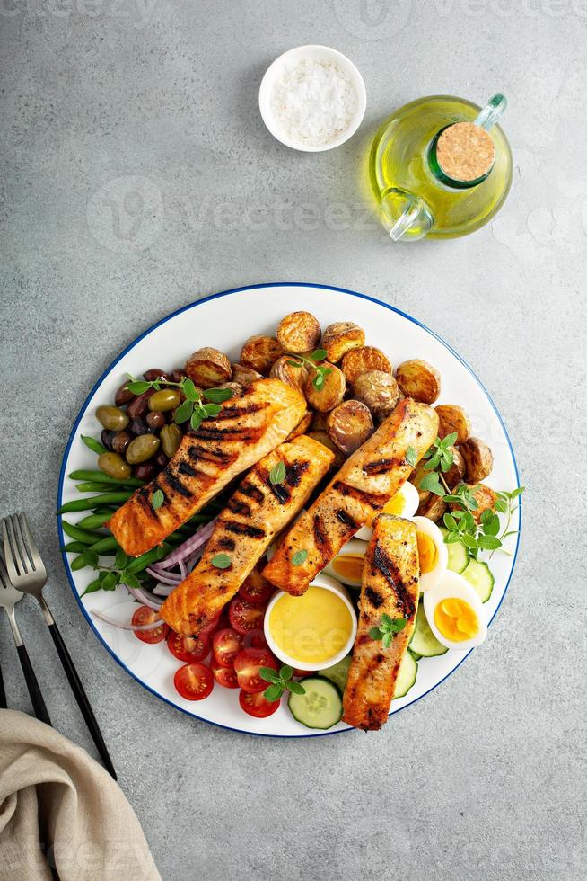 Grilled salmon Nicoise salad photo
