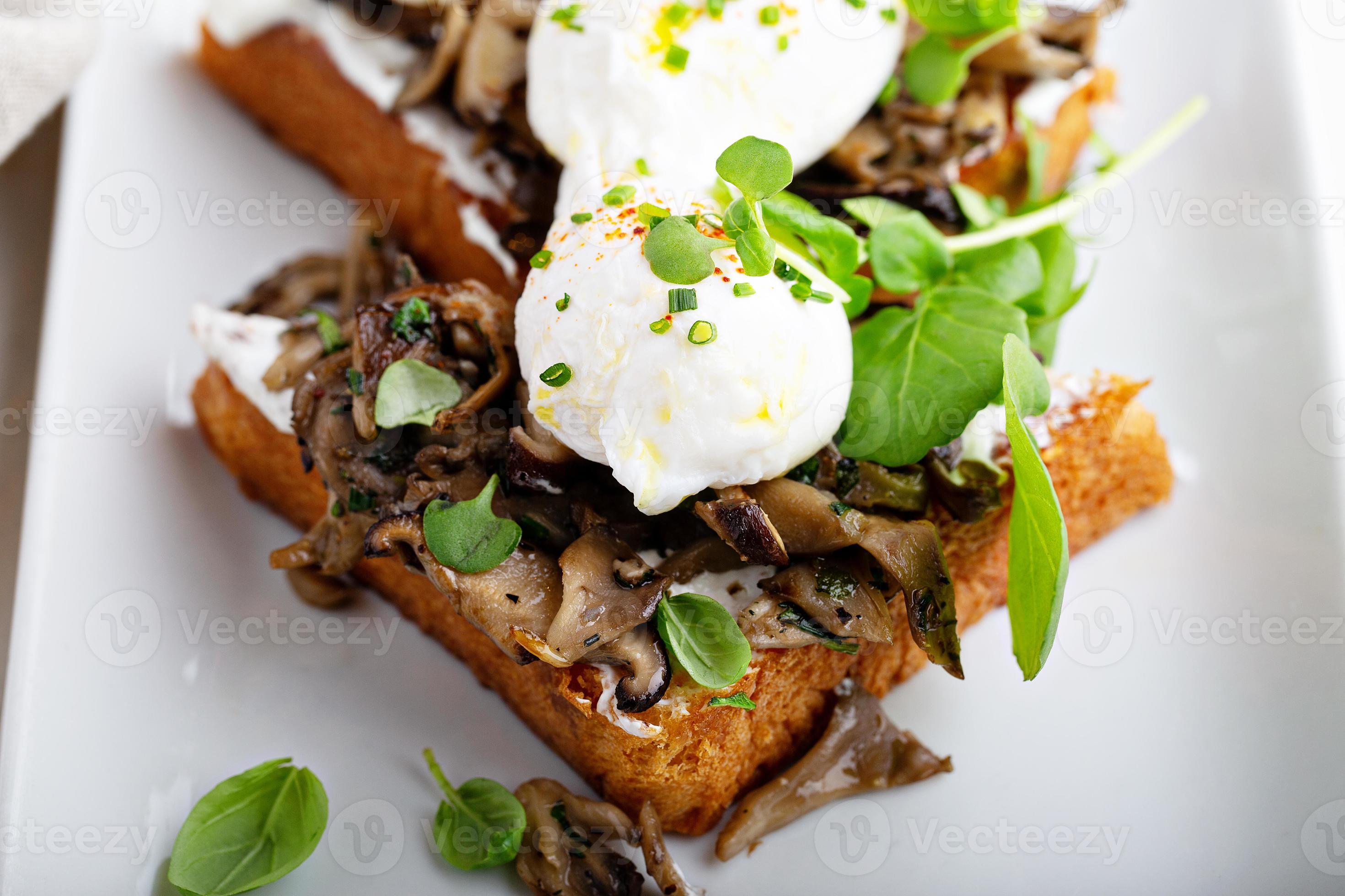 Breakfast toast with mushrooms and poached eggs 16213758 Stock Photo at