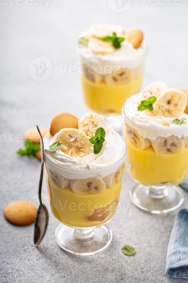 Banana pudding in small glasses photo