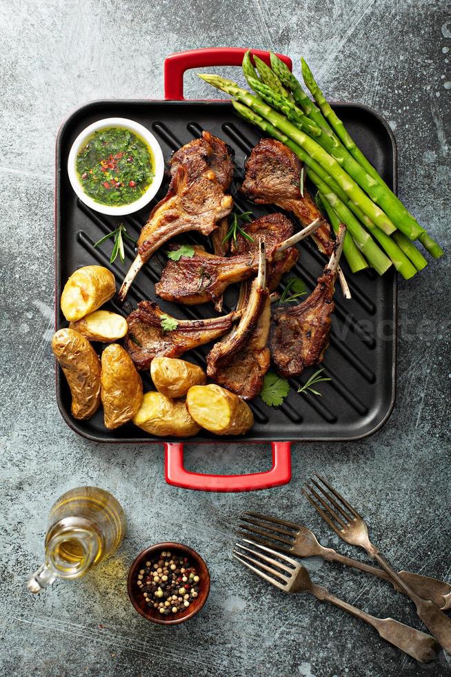 Grilled lamb chops with asparagus and potatoes photo
