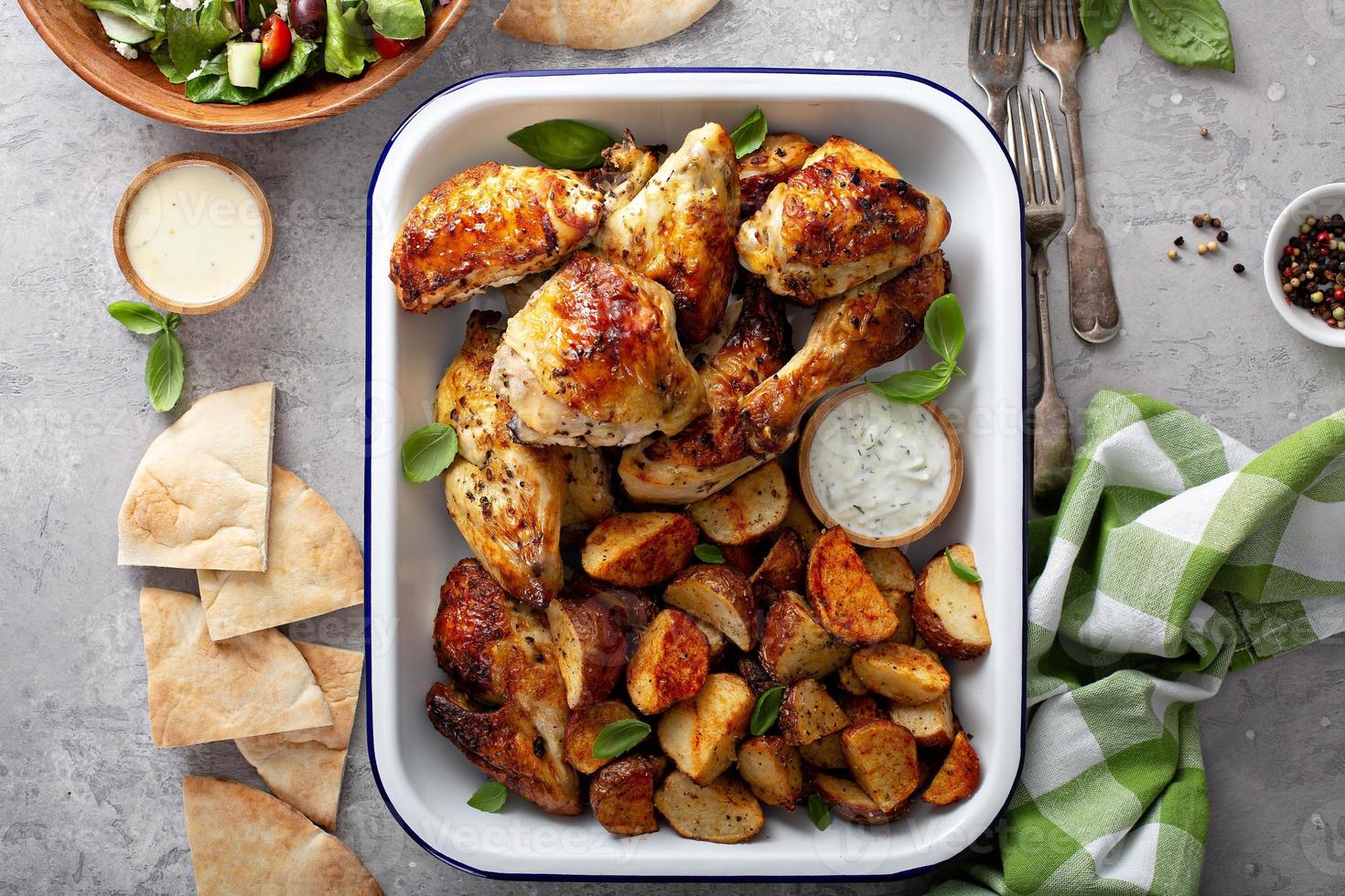 Roasted chicken and potatoes photo