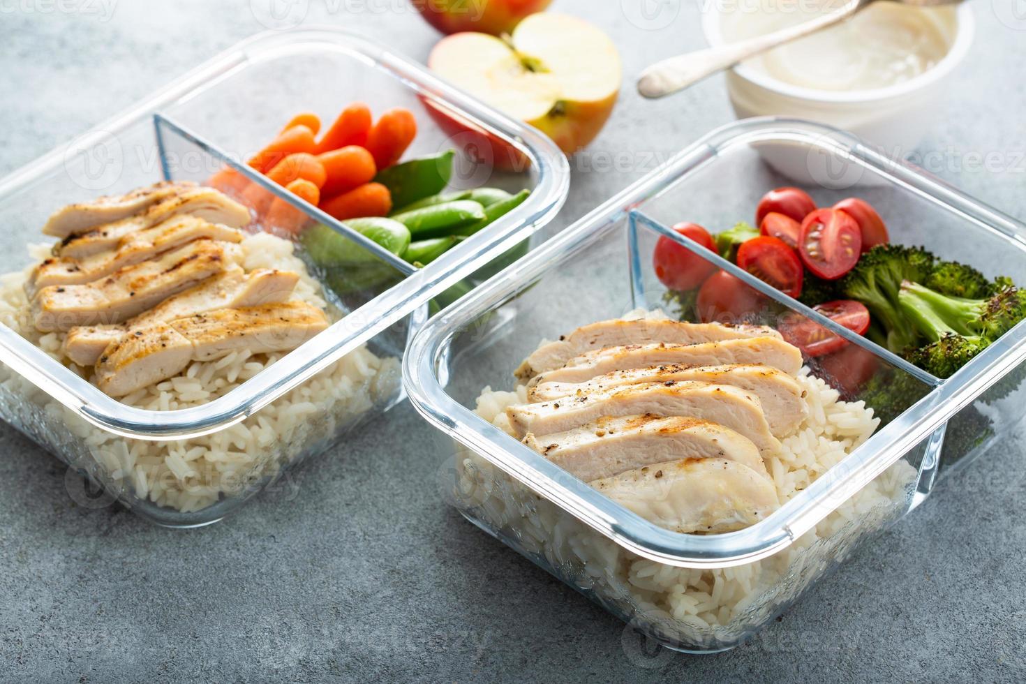 Meal prep containers with healthy lunch to go photo