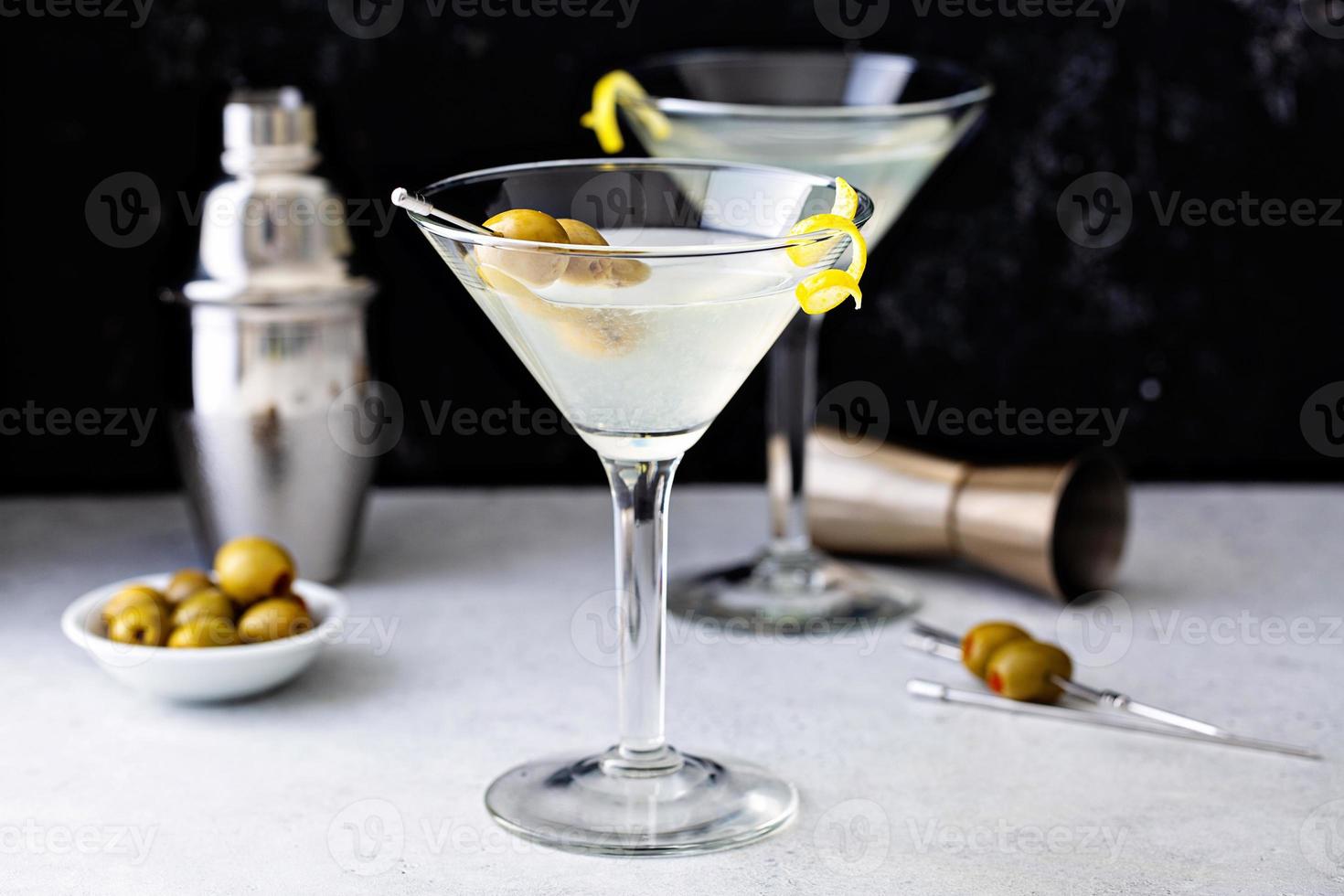 Classic lemon drop martini with olives and lemon photo