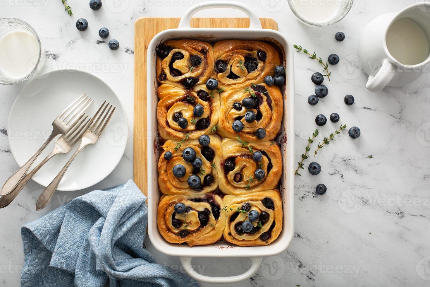 Summer breakfast idea, blueberry cinnamon rolls in a baking dish photo