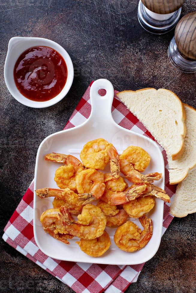 Southern fried shrimp with hot sauce photo