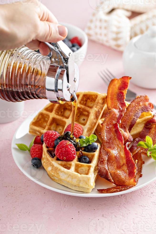 Belgian waffles with bacon and fresh berries for breakfast photo