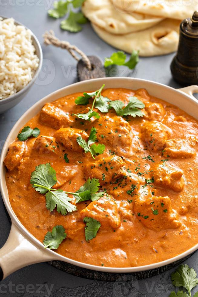 Chicken tikka masala, cooked marinated chicken in spiced curry sauce photo