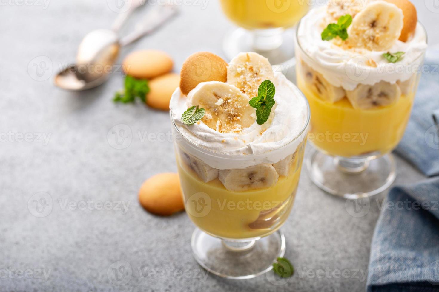 Banana pudding in small glasses photo