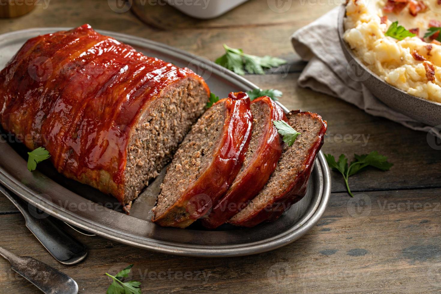 Meatloaf with mashed potatoes and green beans photo