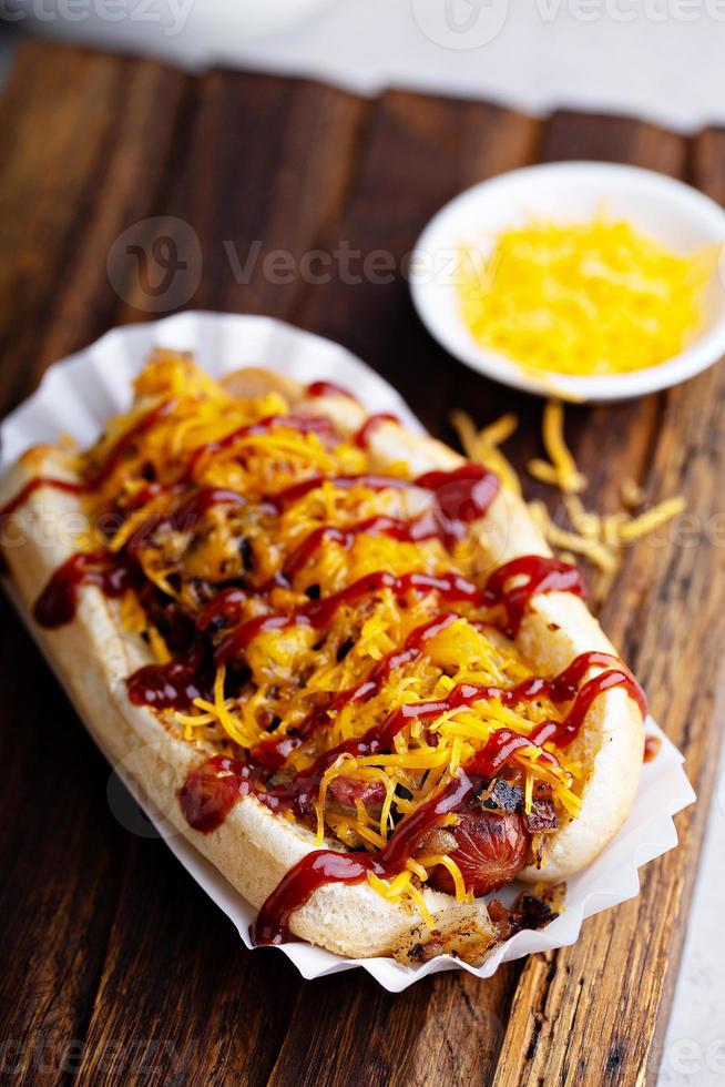 Grilled beef hot dog with bacon and cheese photo