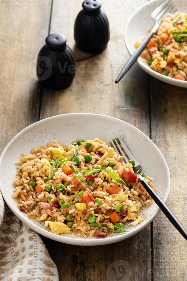 Breakfast fried rice with eggs and bacon photo