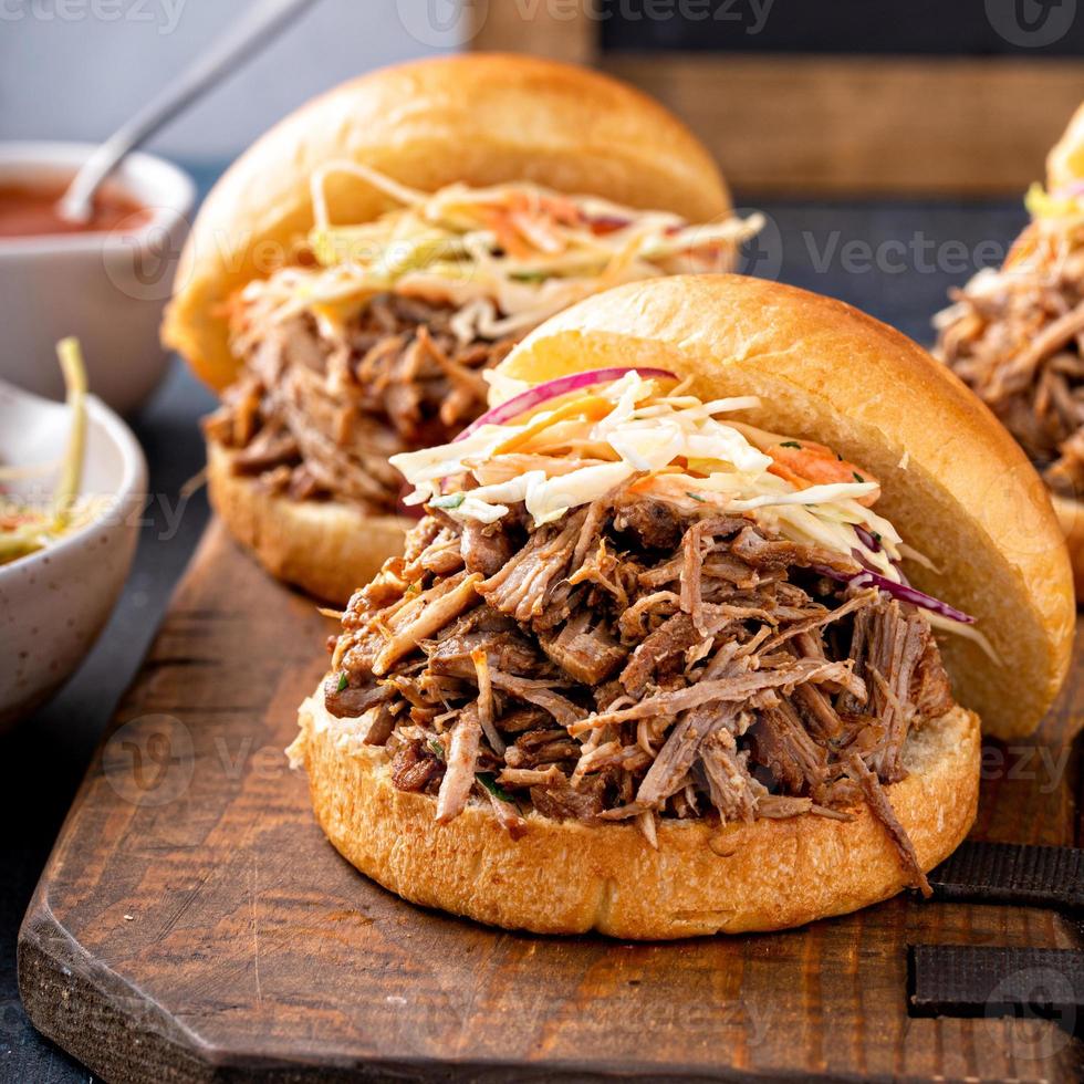 Pulled pork sandwiches with cole slaw on brioche buns photo