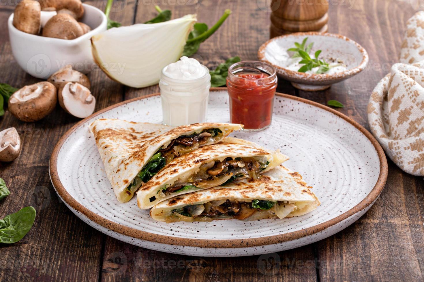 Quesadillas with mushroom, spinach and caramelized onions photo