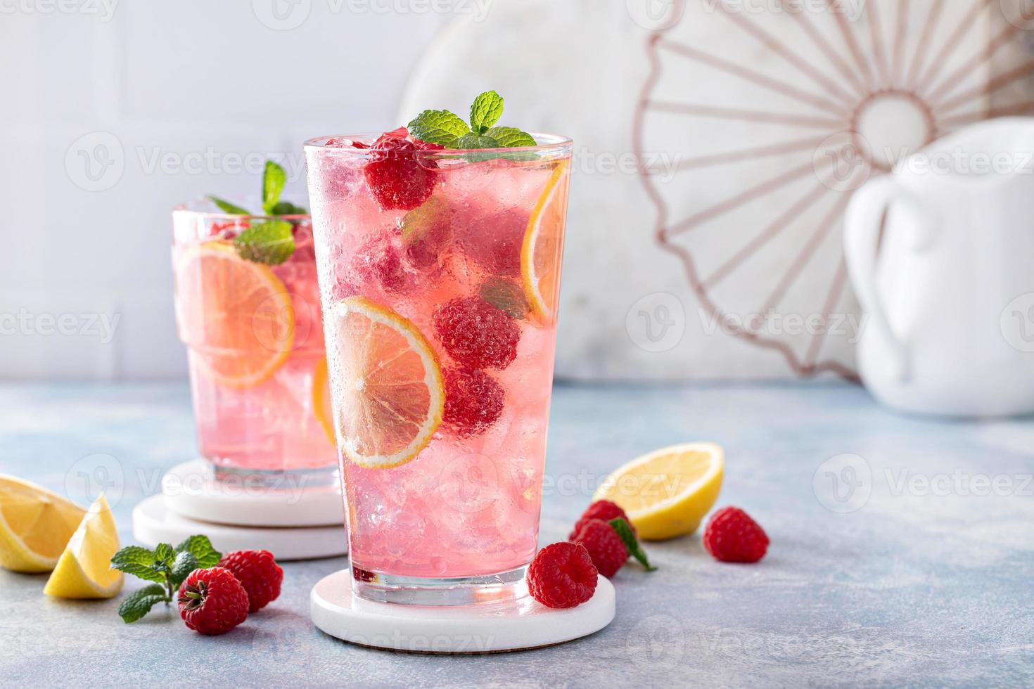 Spring or summer cold cocktail, raspberry lemonade photo