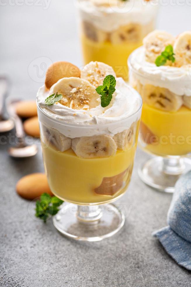 Banana pudding in small glasses photo