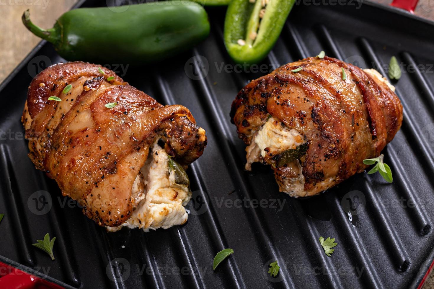 Jalapeno popper chicken wrapped in bacon and stuffed with jalapeno photo