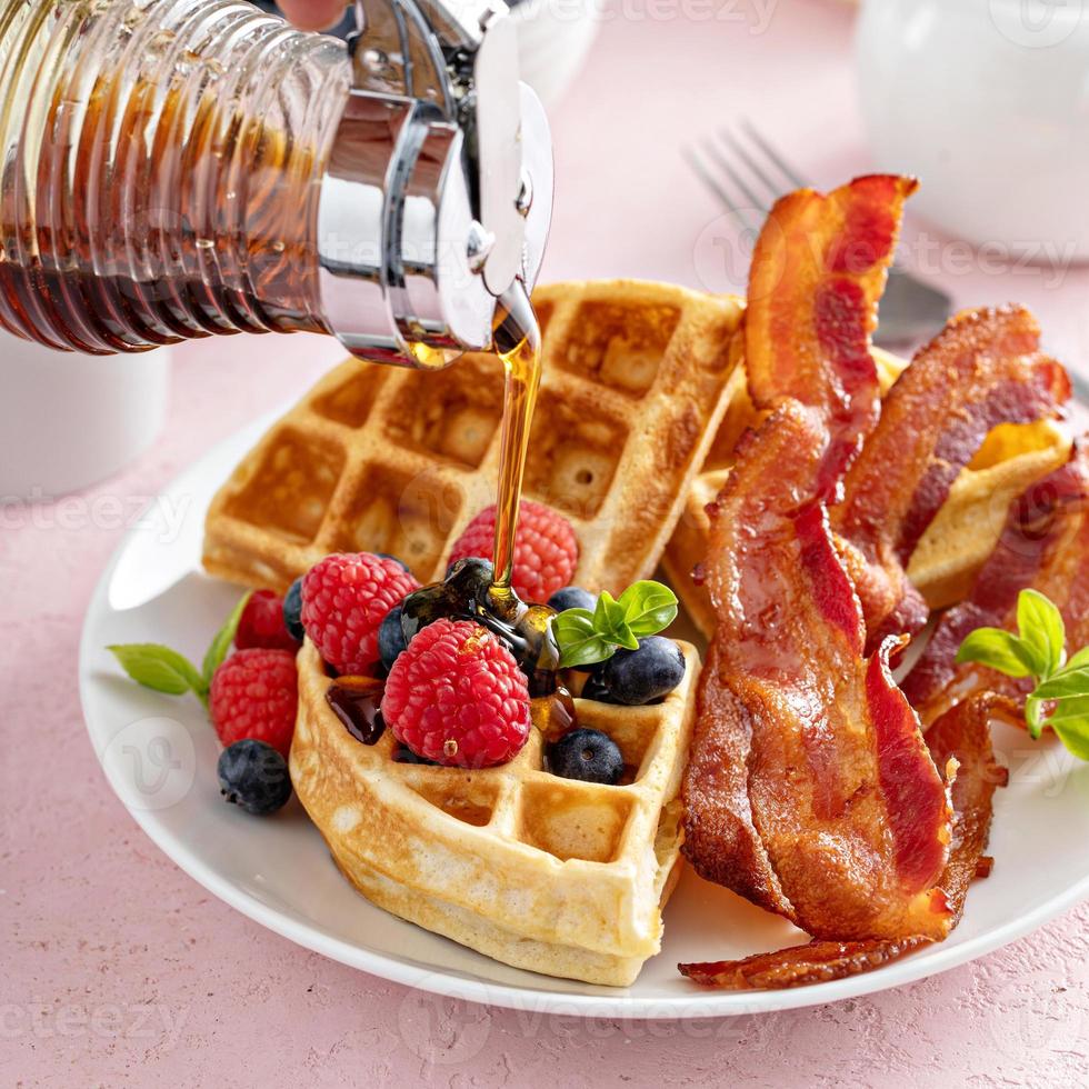 Belgian waffles with bacon and fresh berries for breakfast photo