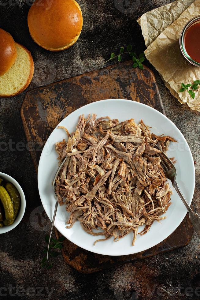 Pulled pork with forks on a plate photo