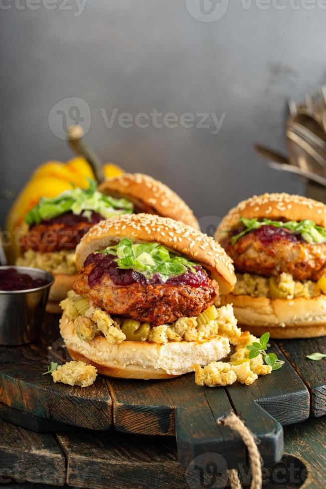 Turkey burgers with stuffing and cranberry sauce photo