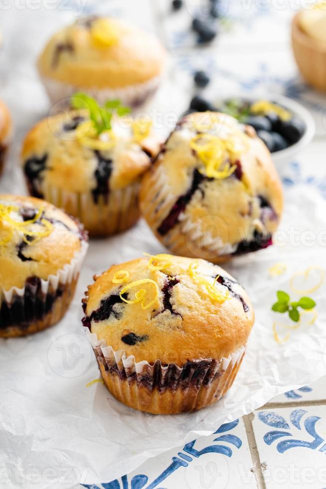 Blueberry muffins with fresh berries and preserves photo