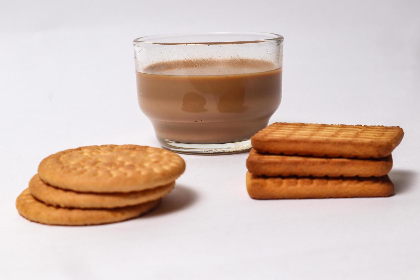 Wheat biscuits in the white plate, Atta biscuit, cookies - close up of a fresh breakfast cookies. photo