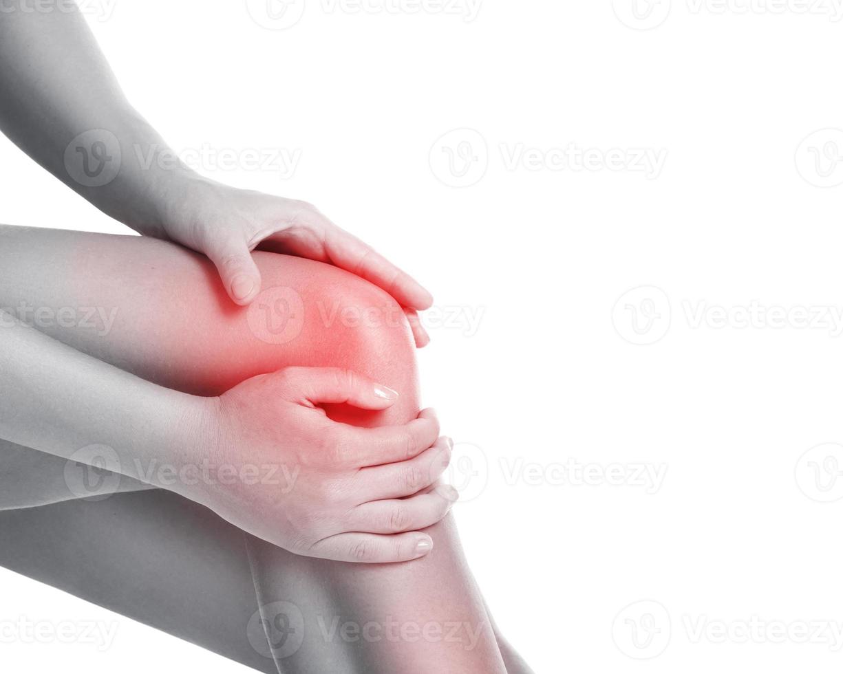 Woman with a source of pain in her knee photo