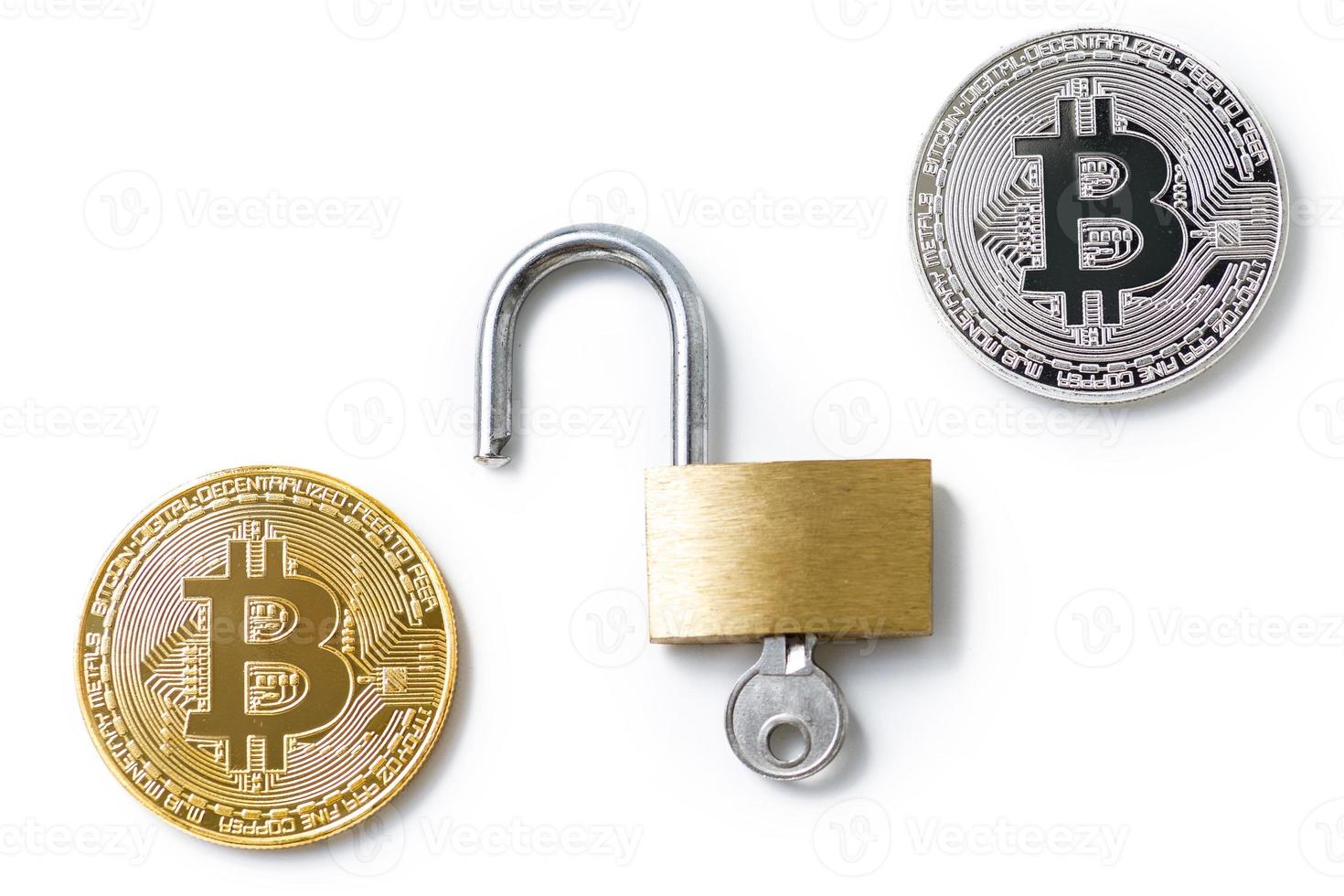 Bitcoin coins and padlock on white background photo