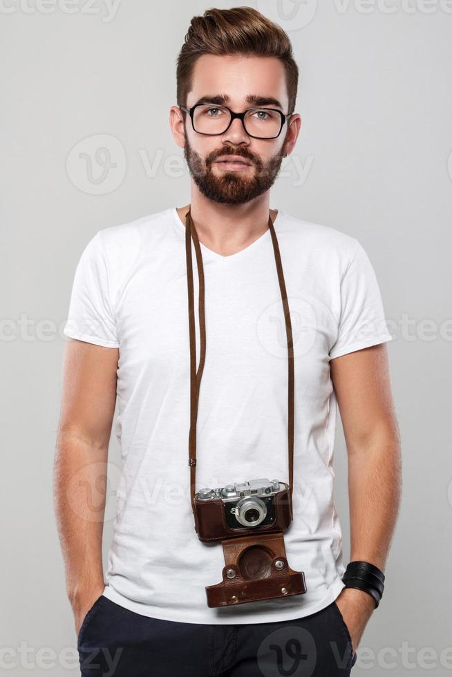 Photographer with retro camera photo