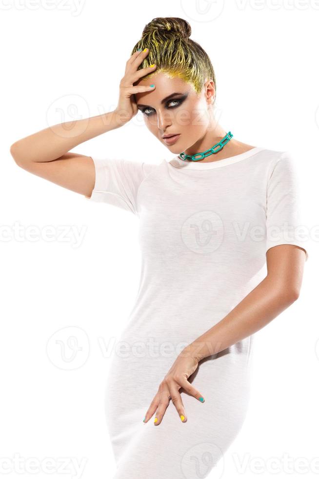 Stylish woman in white dress and chain on her neck photo