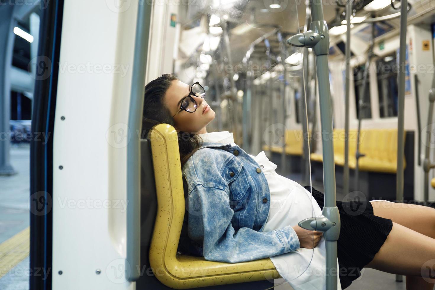 Sexy model is posing in carriage of metro train 16233882 Stock Photo at Vecteezy
